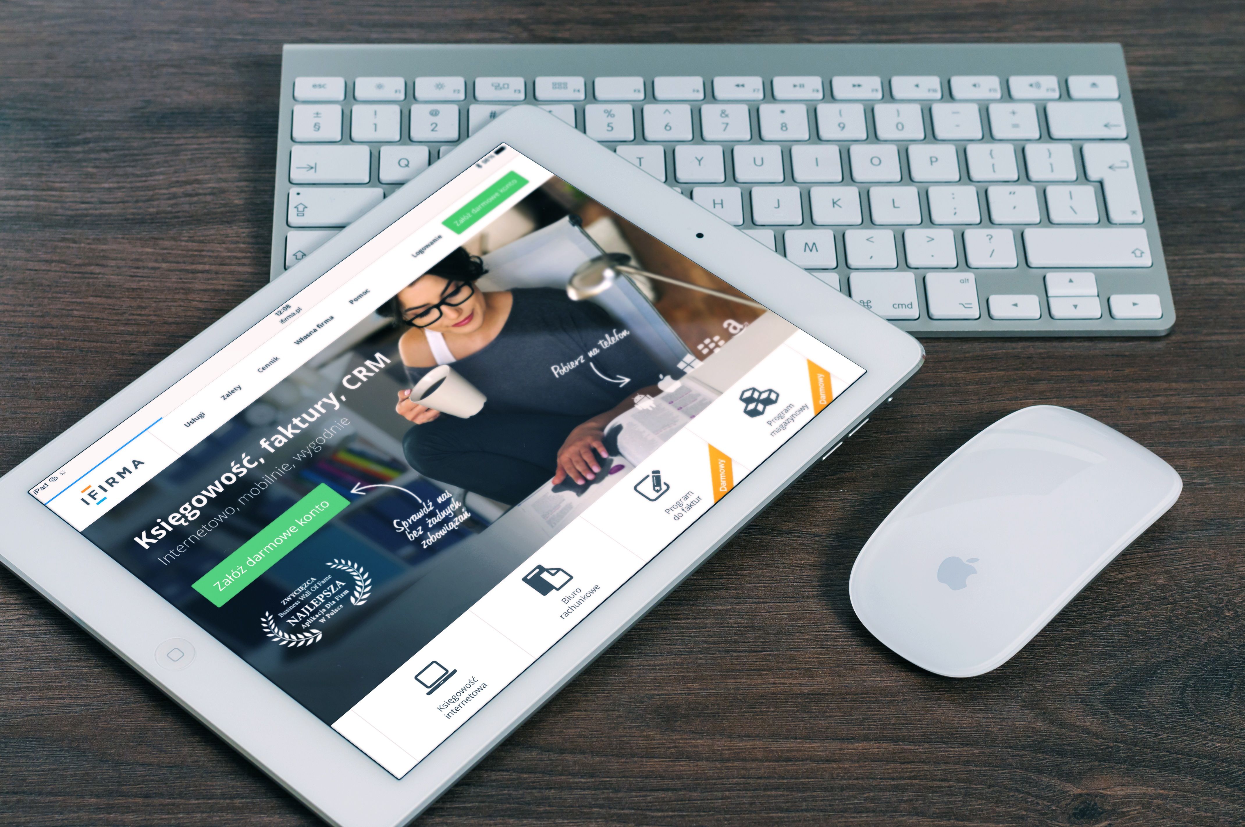 a tablet with a featured website on the screen